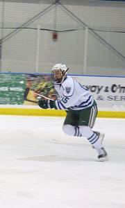Junior Kyle Just skates down the ice with authority.: Sam Rappi photo